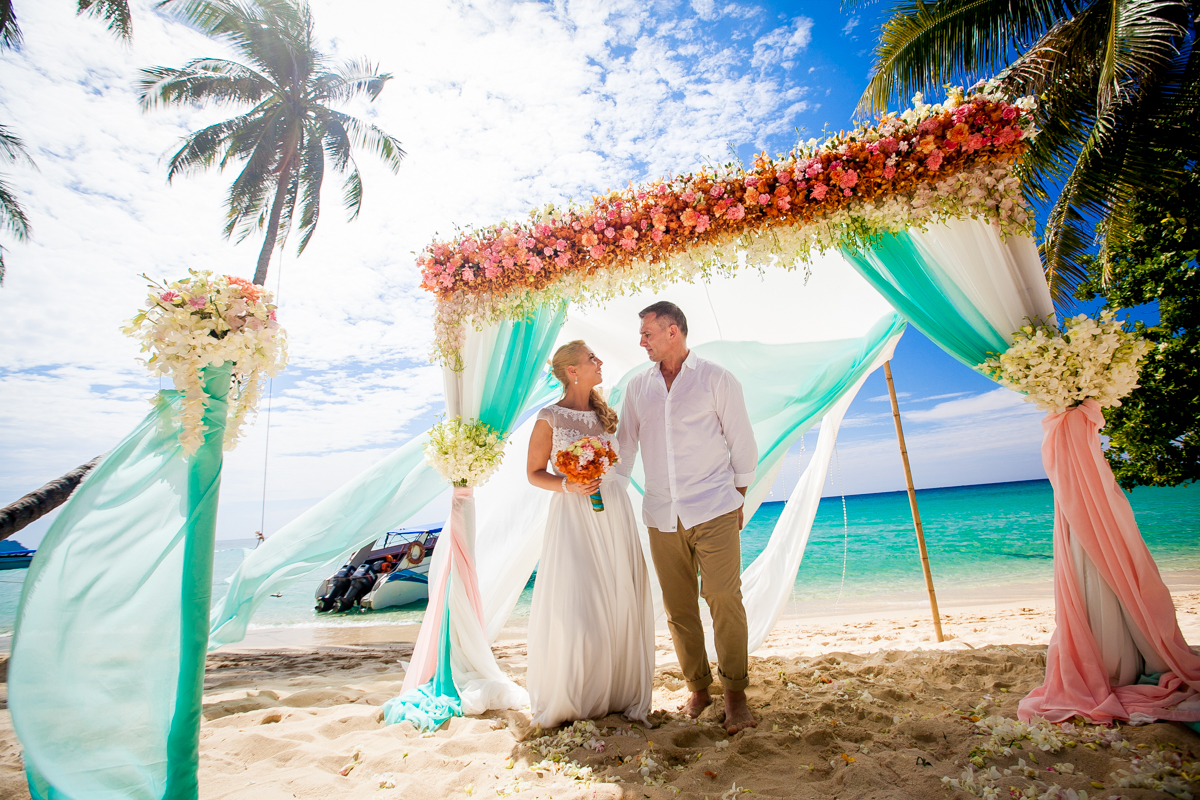 Beautiful fresh flower wedding ceremony at Cabana Resort beach
