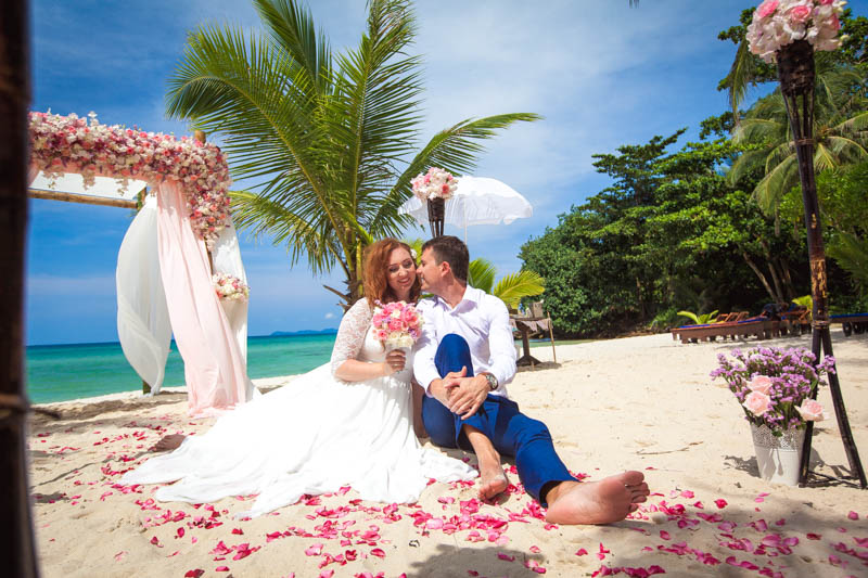 Beautiful fresh flower wedding ceremony at Medee Resort beach